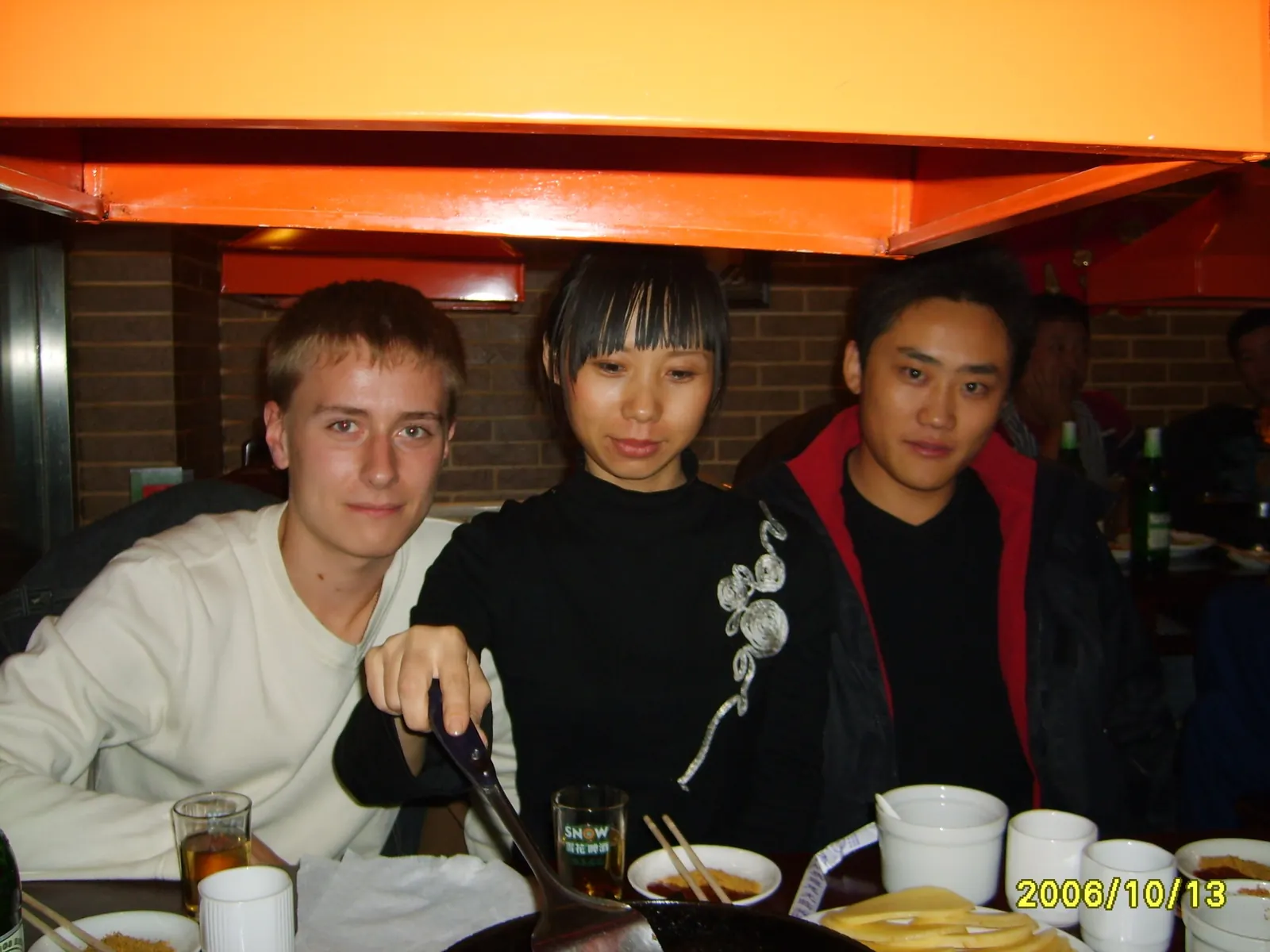 With friends at a Chinese restaurant, 2006