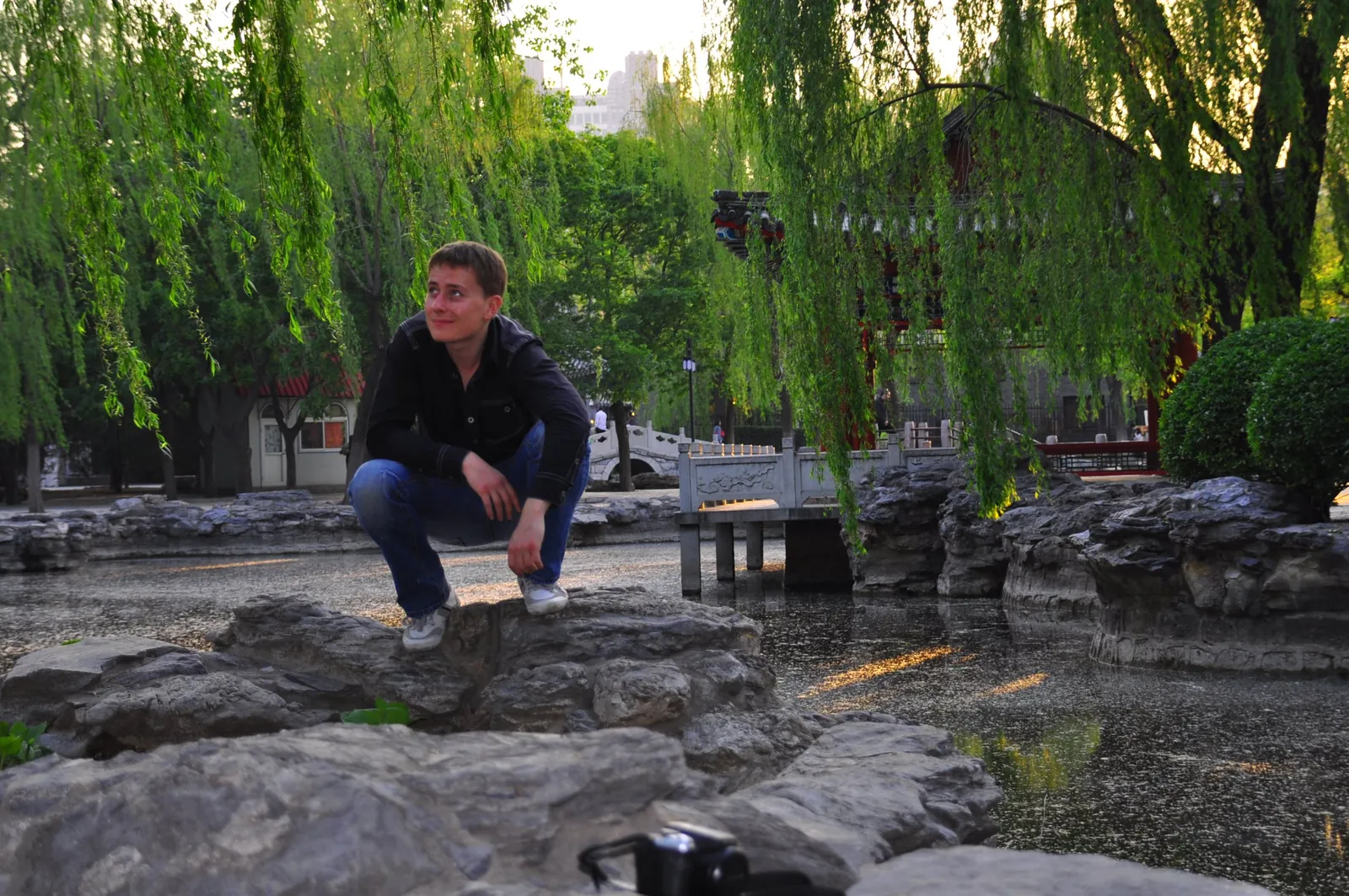 Ivan by a pond in a park