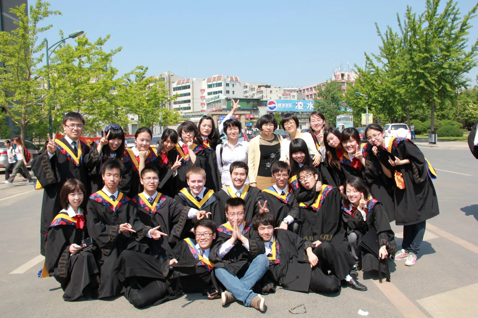 Graduation day with classmates and professors
