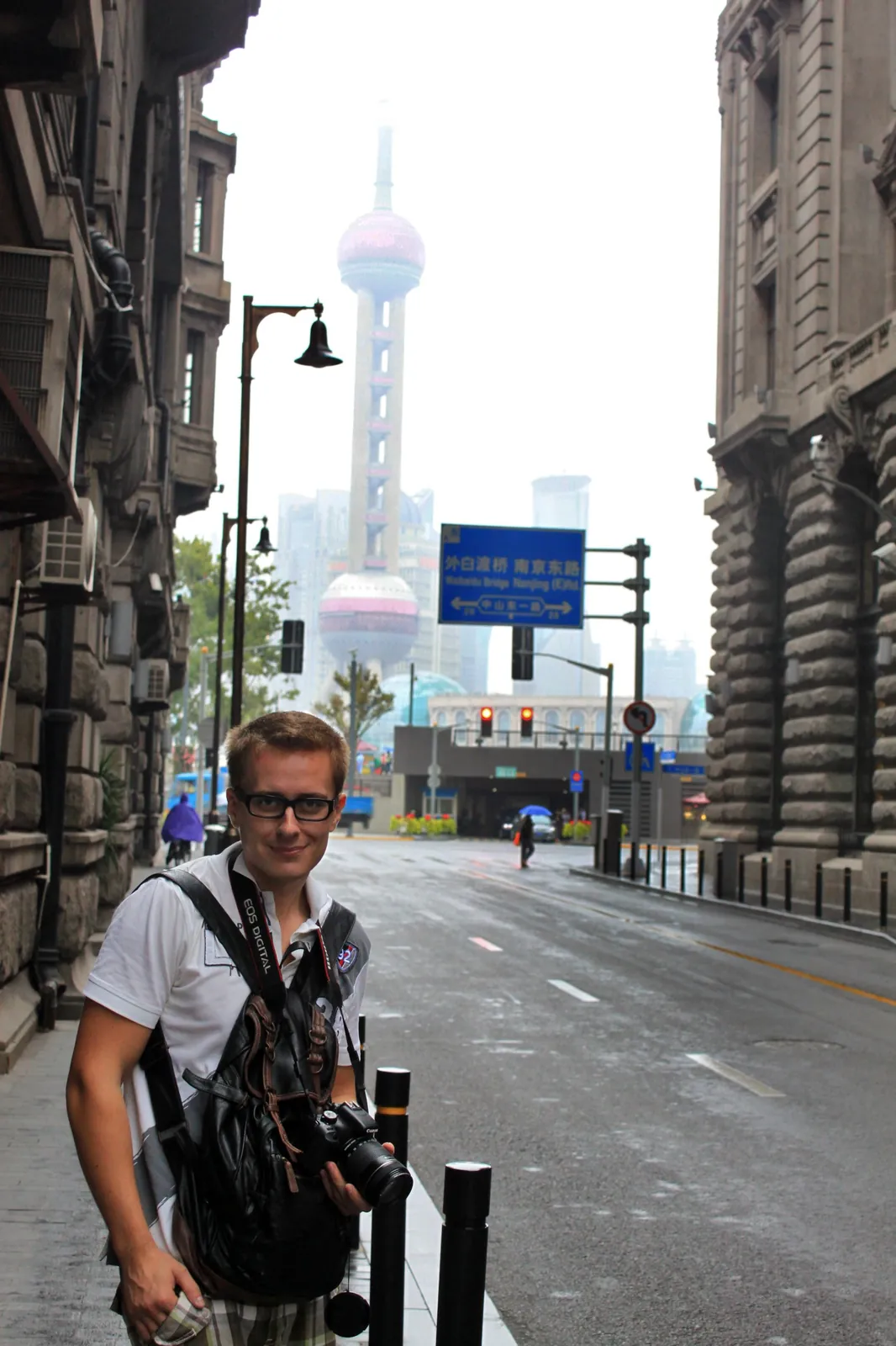 Ivan in Shanghai, with the Oriental Pearl Tower behind