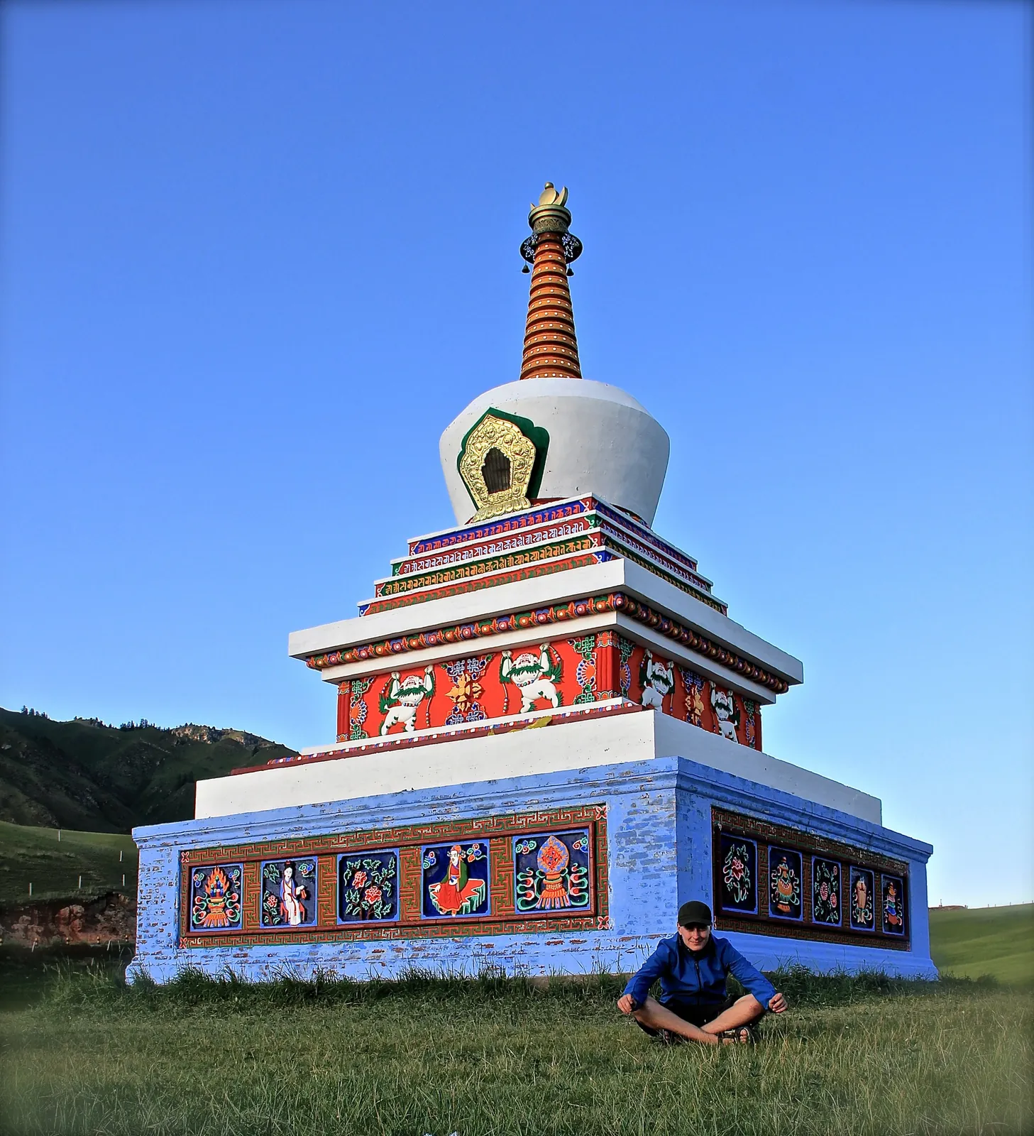 By a Buddhist stupa on a cycling trip