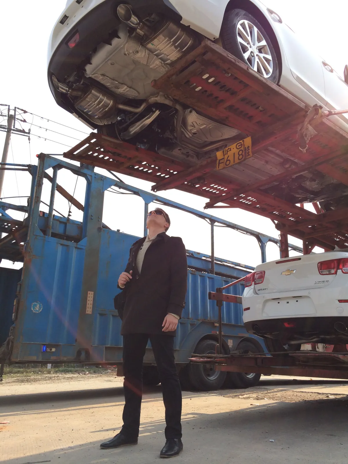 Cars for a client loaded onto a car carrier