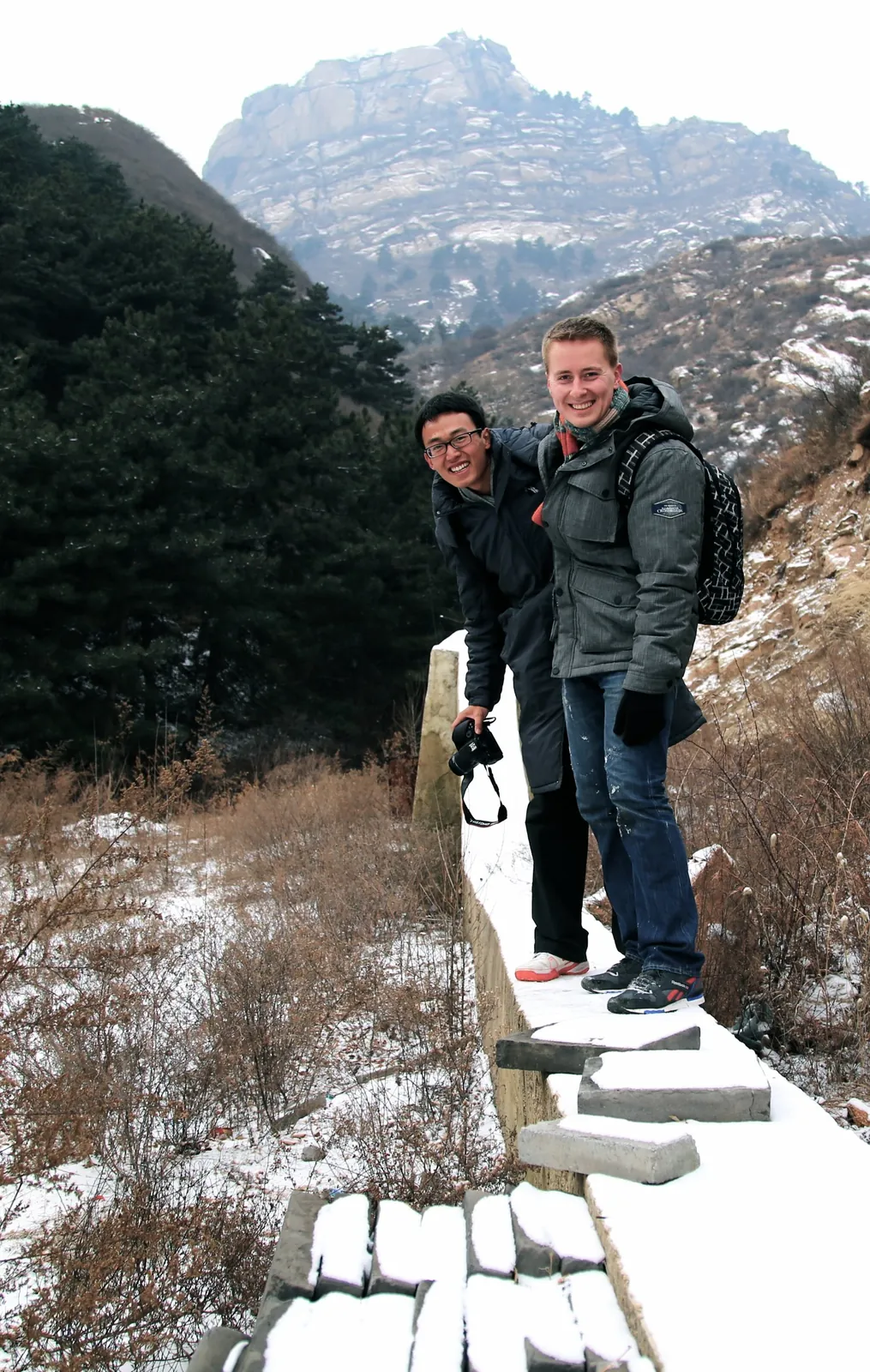 With a friend in the mountains in winter