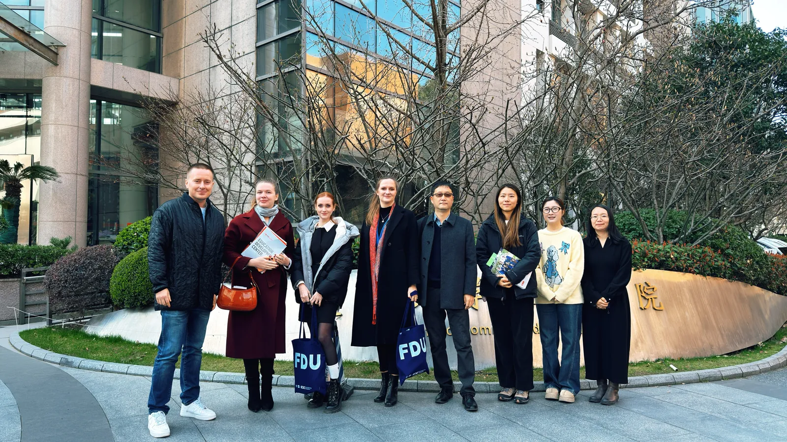 A delegation outside a business center in Shanghai