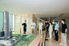 The delegation reviews a development project in Shenzhen