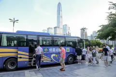 Mission participants boarding the bus in Shenzhen