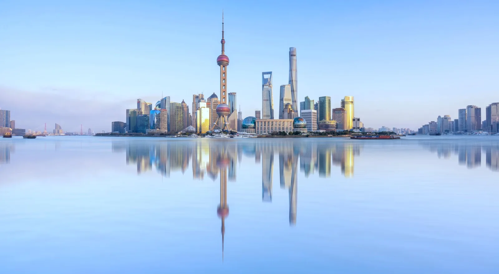 Shanghai skyscrapers reflected in the Huangpu River