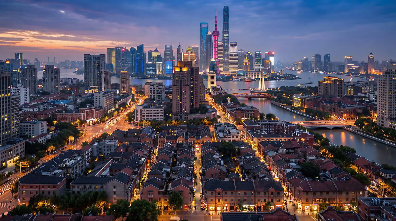 Shanghai in the evening: Pudong skyscrapers above the Huangpu River