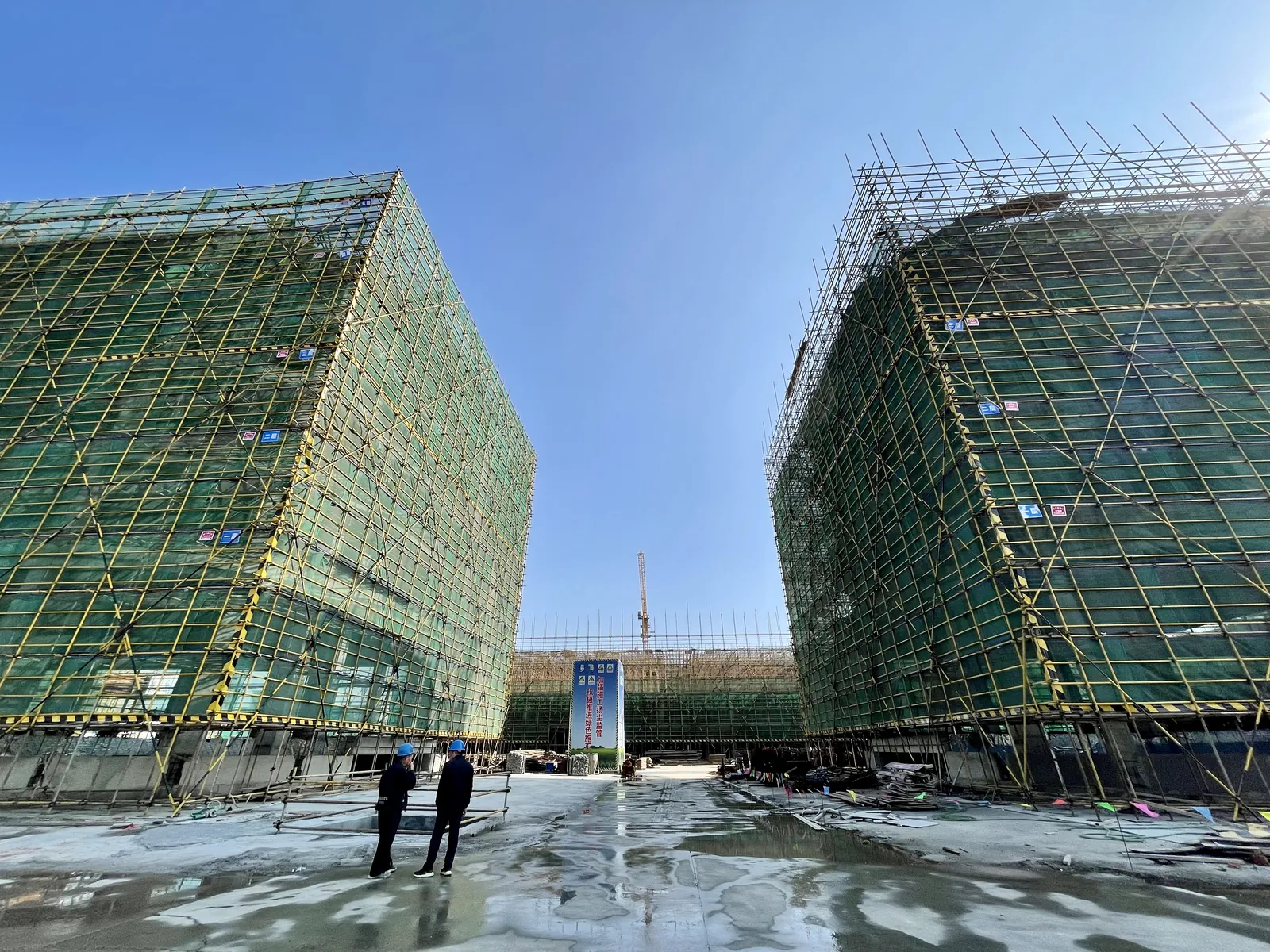 Technopark buildings under scaffolding, view from the site